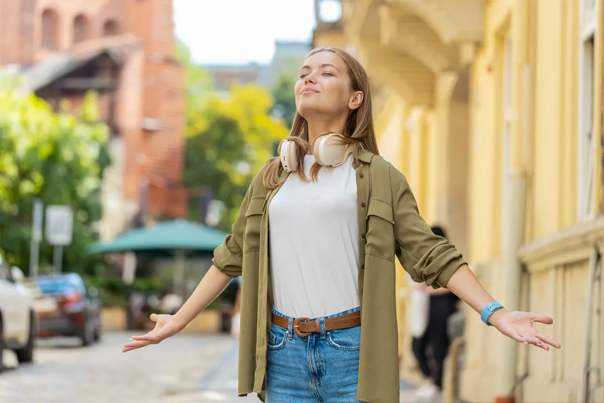 Woman taking a deep breath of fresh air