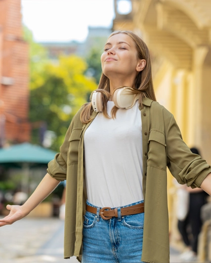 Woman taking a deep breath of fresh air